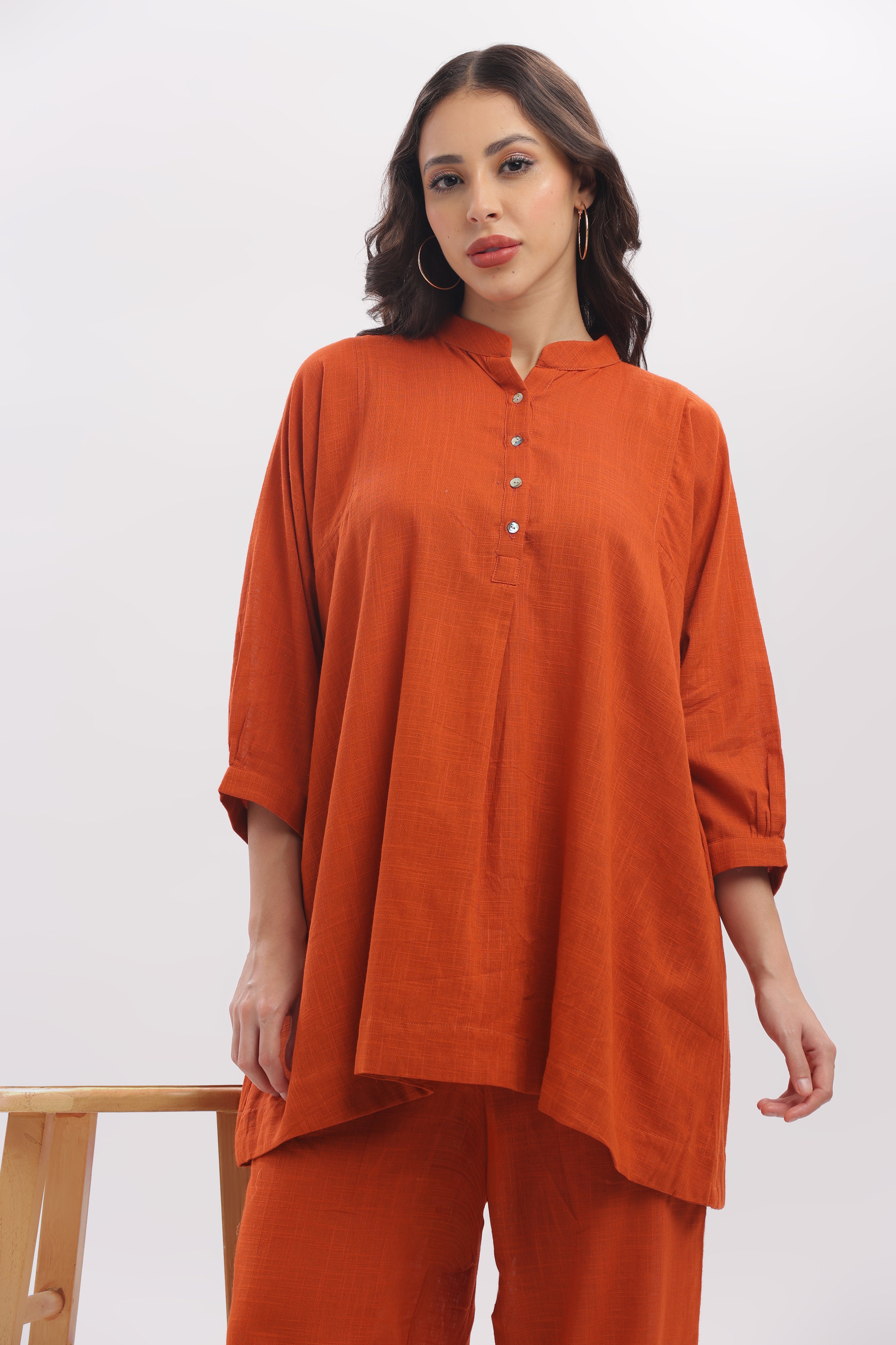 TSR  Teracotta peplum top